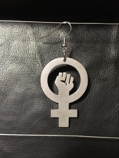 Feminist sign, big earring